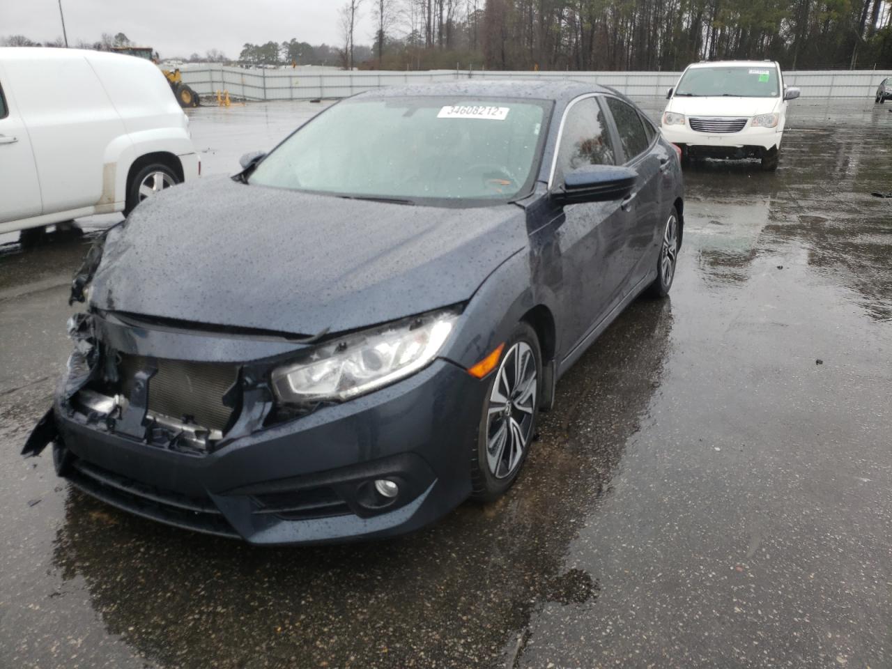 Photo 2 from auction – 2018 HONDA CIVIC EX with VIN JHMFC1F34JX038282