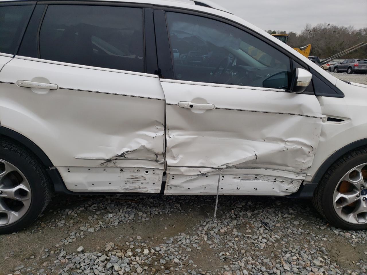 Photo 9 from auction – 2013 FORD ESCAPE TIT with VIN 1FMCU0J97DUD15340
