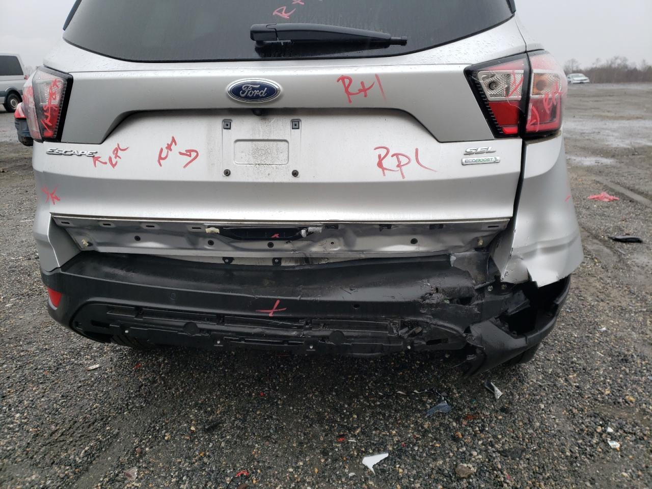 Photo 9 from auction – 2018 FORD ESCAPE SEL with VIN 1FMCU0HD2JUB37200