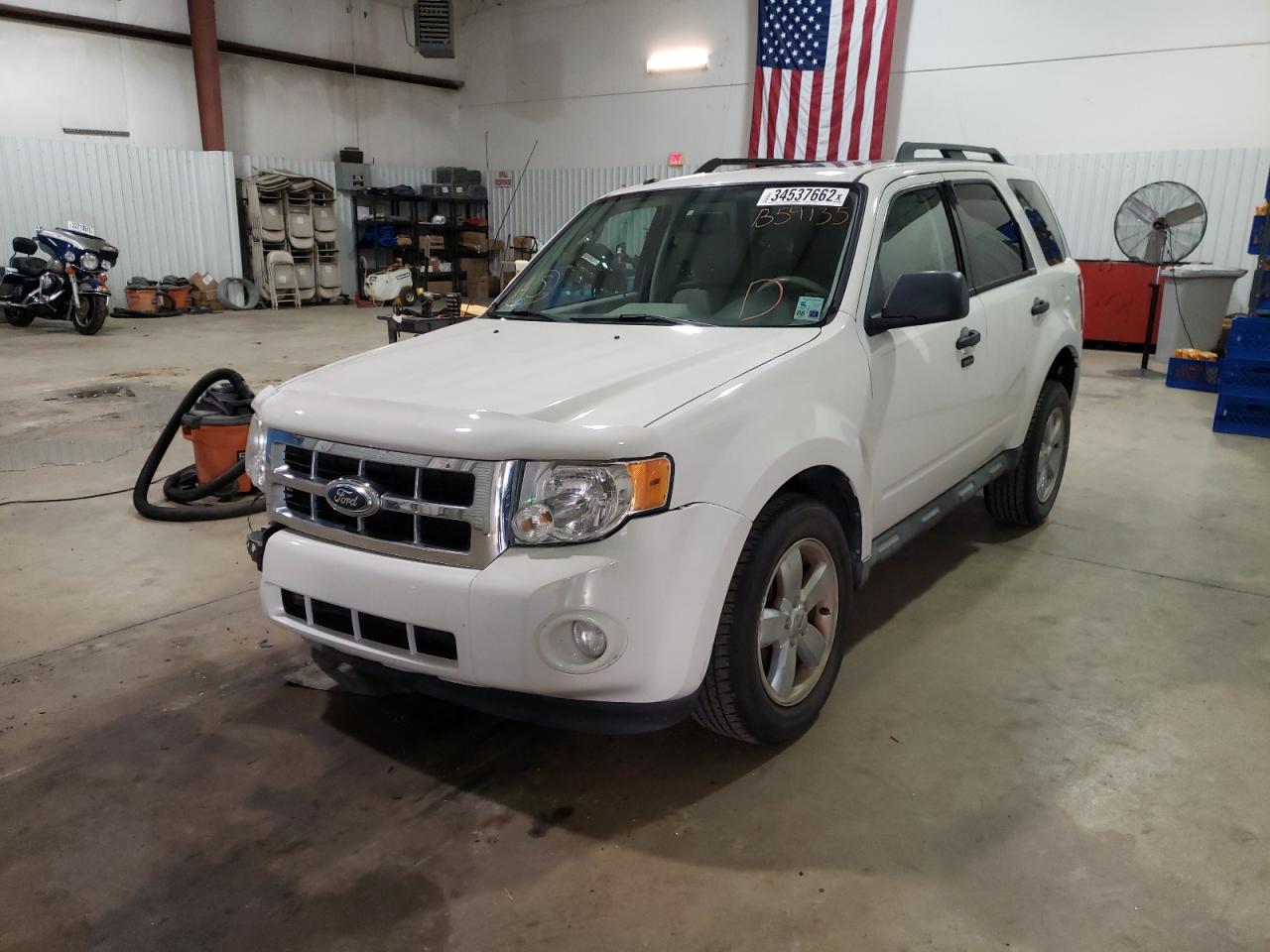 Photo 12 from auction – 2010 FORD ESCAPE XLT with VIN 1FMCU0DG9AKB54135