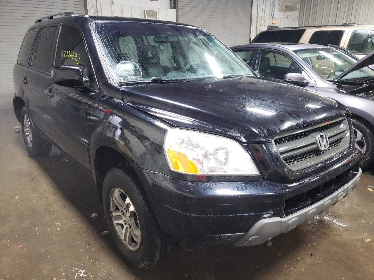 HONDA PILOT EXL 2004 with VIN 2HKYF187X4H613664 - Photo from auction