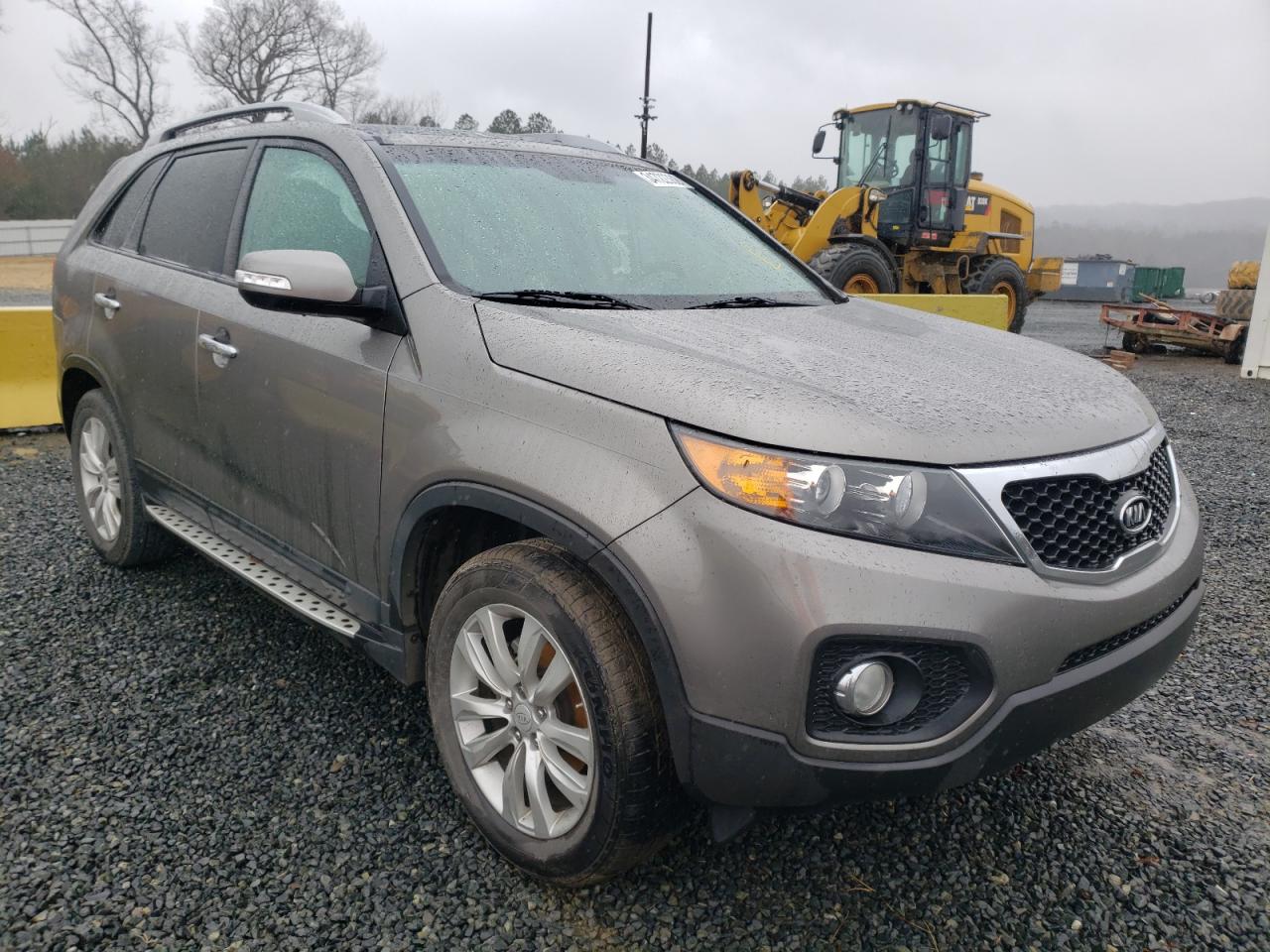 KIA SORENTO EX 2011 with VIN 5XYKU4A29BG178992 - Photo from auction