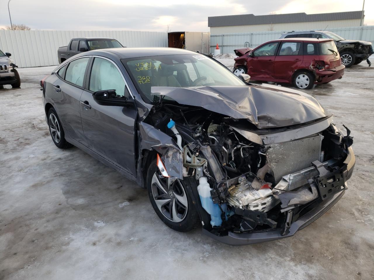 HONDA CIVIC LX 2019 with VIN 19XFC2F63KE028054 - Photo from auction