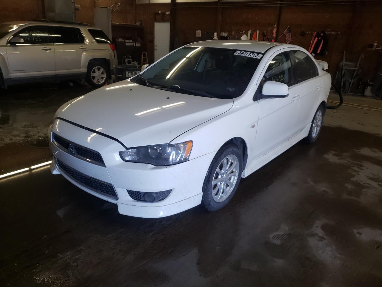 Photo 2 from auction – 2012 MITSUBISHI LANCER SE with VIN JA32V2FW9CU027128