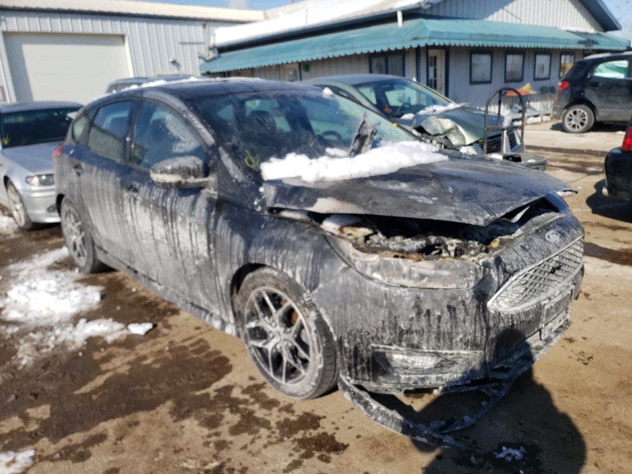 FORD FOCUS SE 2015 with VIN 1FADP3K27FL209343 - Photo from auction