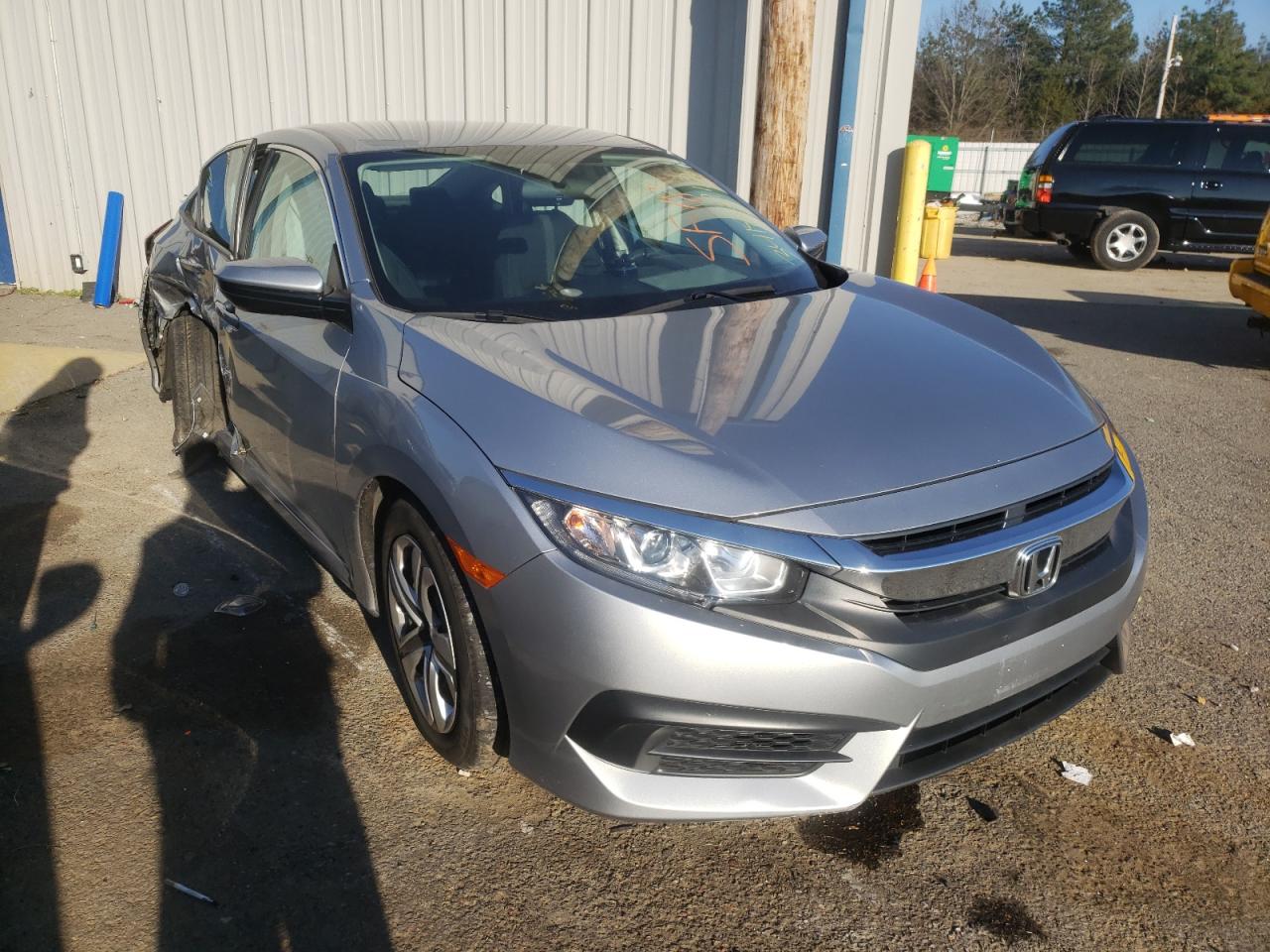 HONDA CIVIC LX 2018 with VIN 2HGFC2F51JH587310 - Photo from auction
