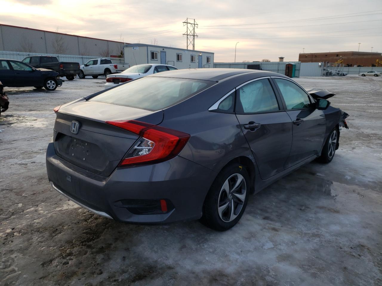 Photo 4 from auction – 2019 HONDA CIVIC LX with VIN 19XFC2F63KE028054