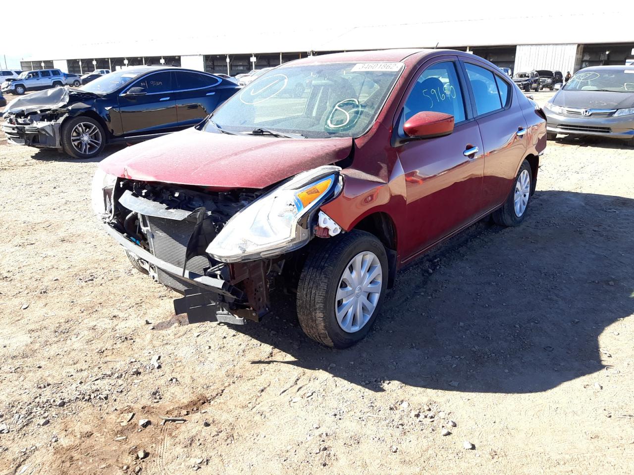 Photo 12 from auction – 2017 NISSAN VERSA S with VIN 3N1CN7AP9HK472532