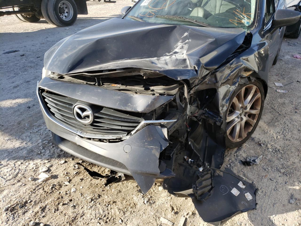 Photo 9 from auction – 2015 MAZDA 6 TOURING with VIN JM1GJ1V5XF1190527