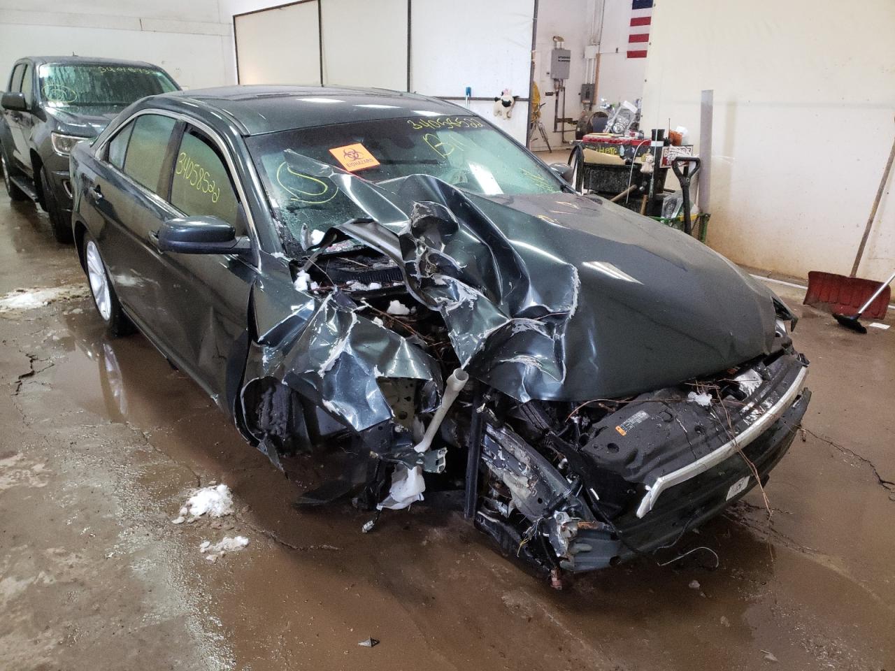 FORD TAURUS SEL 2016 with VIN 1FAHP2E86GG103956 - Photo from auction