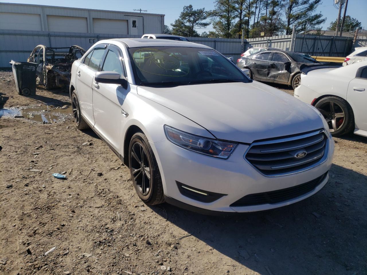FORD TAURUS SEL 2013 with VIN 1FAHP2E80DG125608 - Photo from auction