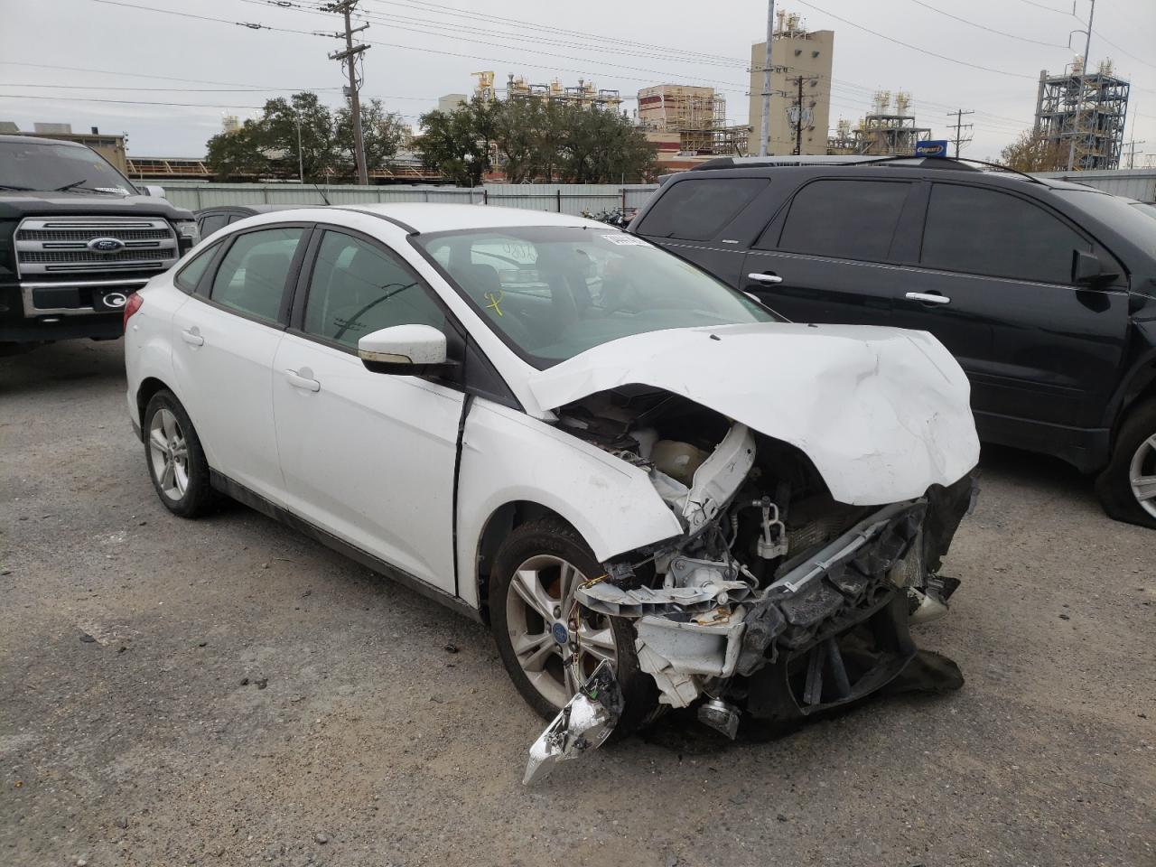 FORD FOCUS SE 2014 with VIN 1FADP3F25EL108990 - Photo from auction