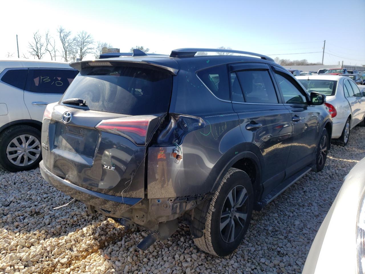 Photo 4 from auction – 2017 TOYOTA RAV4 XLE with VIN JTMWFREV8HD101552