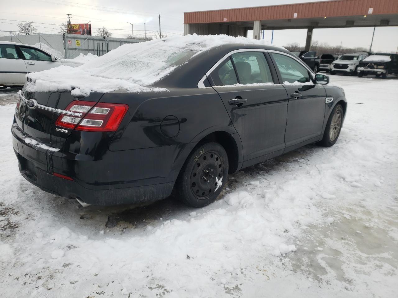Photo 4 from auction – 2014 FORD TAURUS SE with VIN 1FAHP2D85EG168604