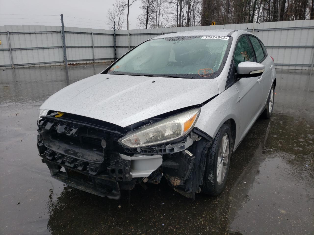 Photo 2 from auction – 2016 FORD FOCUS SE with VIN 1FADP3K22GL224043