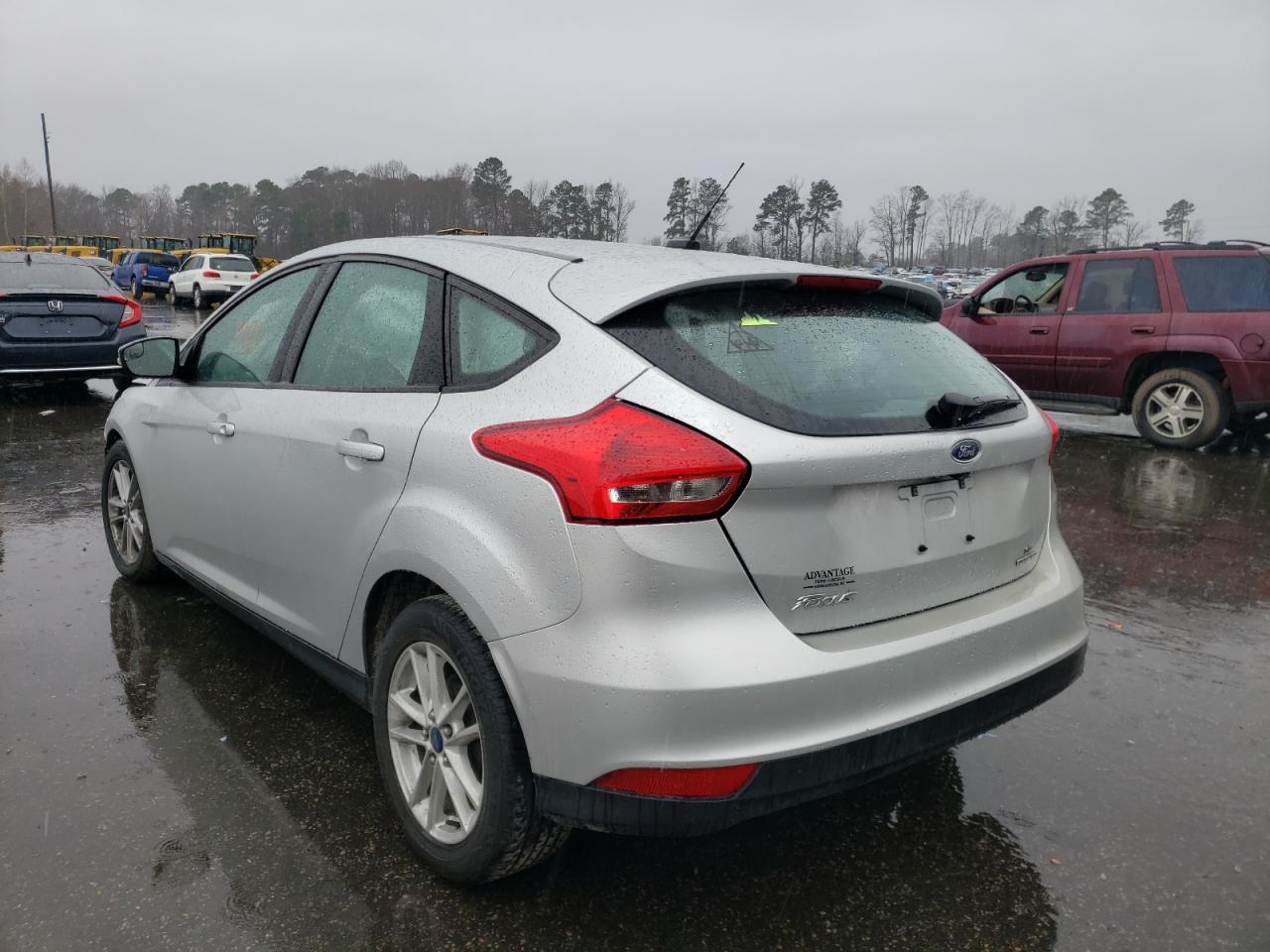 Photo 3 from auction – 2016 FORD FOCUS SE with VIN 1FADP3K22GL224043