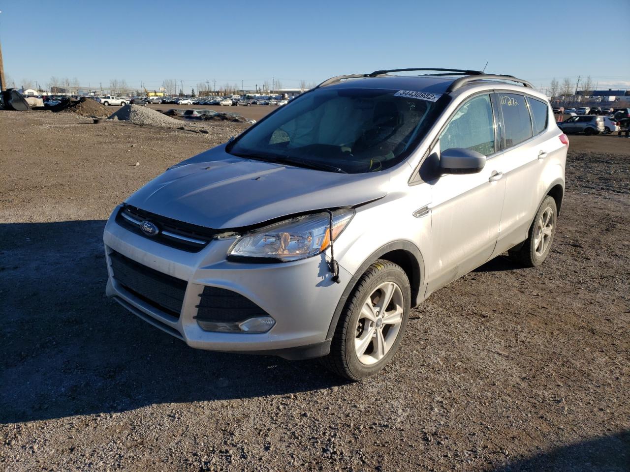 Photo 2 from auction – 2016 FORD ESCAPE SE with VIN 1FMCU9G96GUC84274