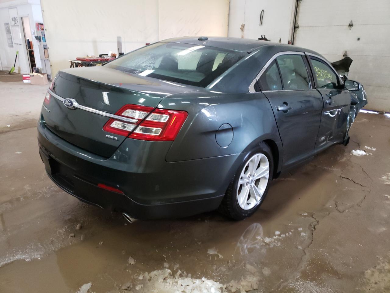 Photo 4 from auction – 2016 FORD TAURUS SEL with VIN 1FAHP2E86GG103956