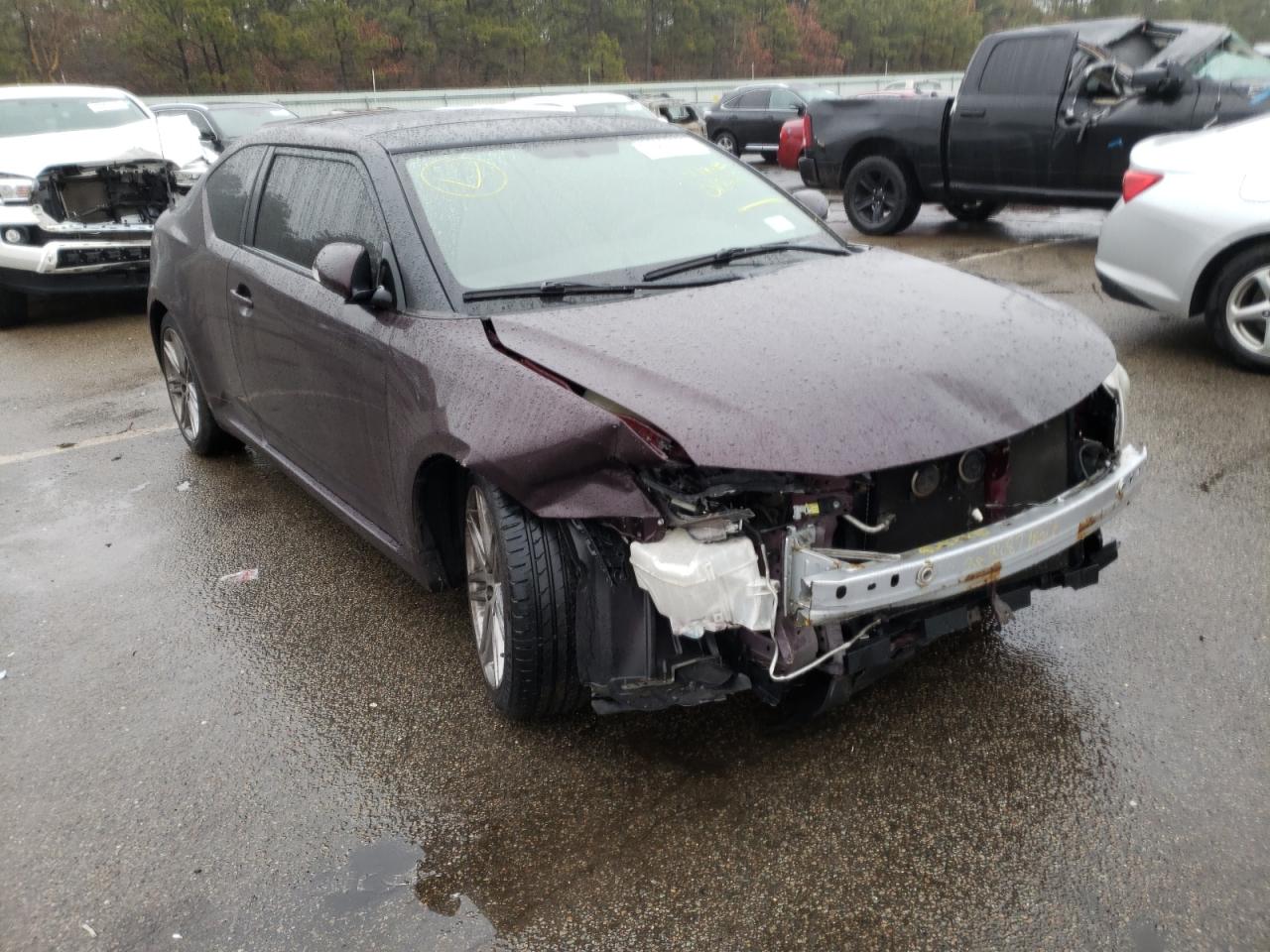 TOYOTA SCION TC 2011 with VIN JTKJF5C73B3018415 - Photo from auction
