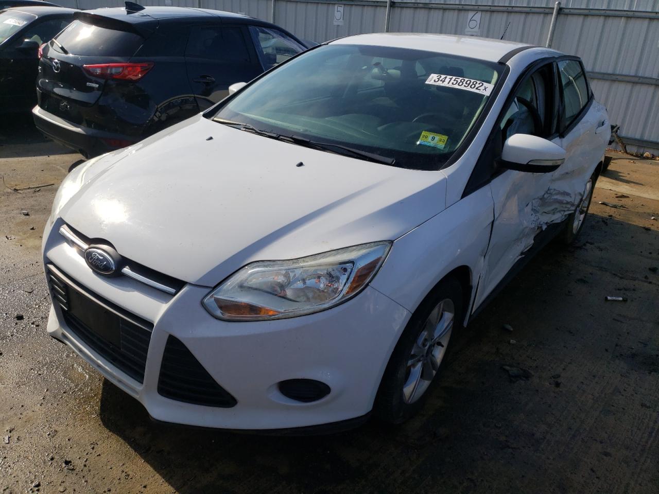 Photo 2 from auction – 2014 FORD FOCUS SE with VIN 1FADP3F24EL308923