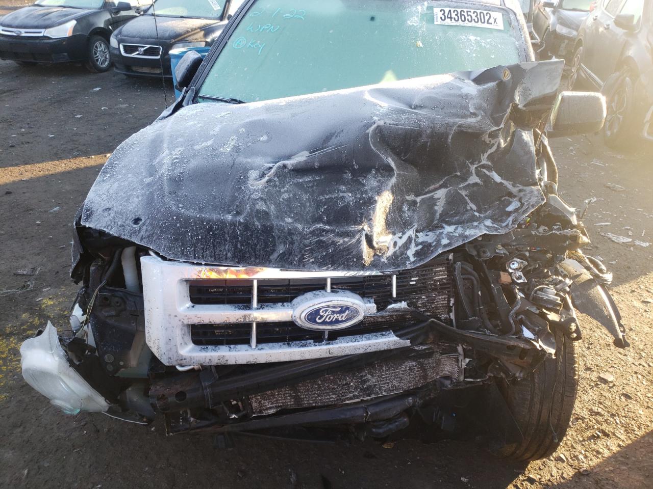 Photo 7 from auction – 2012 FORD ESCAPE LIM with VIN 1FMCU0EG4CKB51855