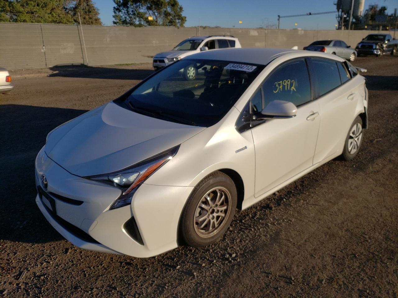 Photo 2 from auction – 2016 TOYOTA PRIUS with VIN JTDKARFU7G3026799