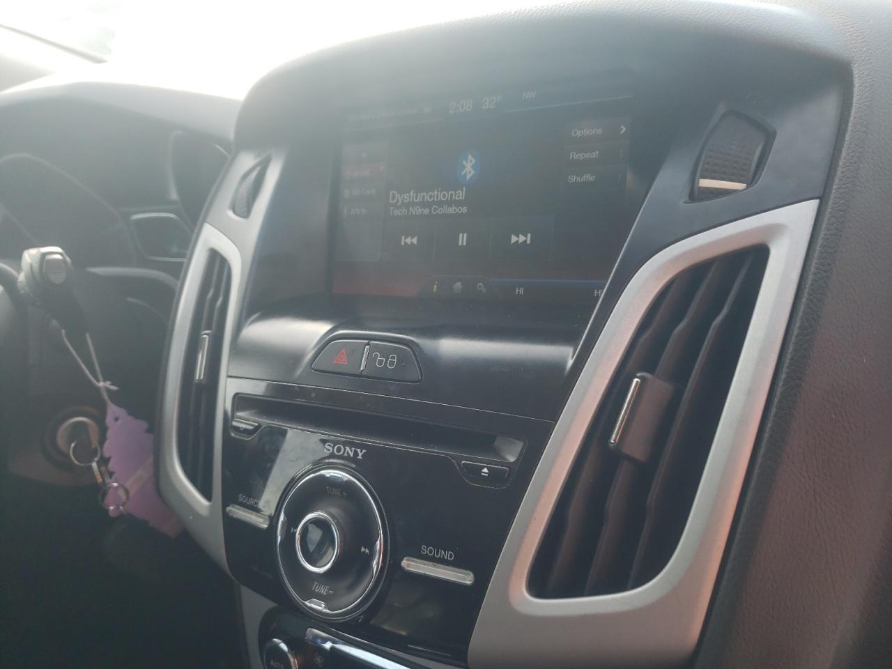 Photo 9 from auction – 2013 FORD FOCUS SE with VIN 1FADP3K2XDL115020
