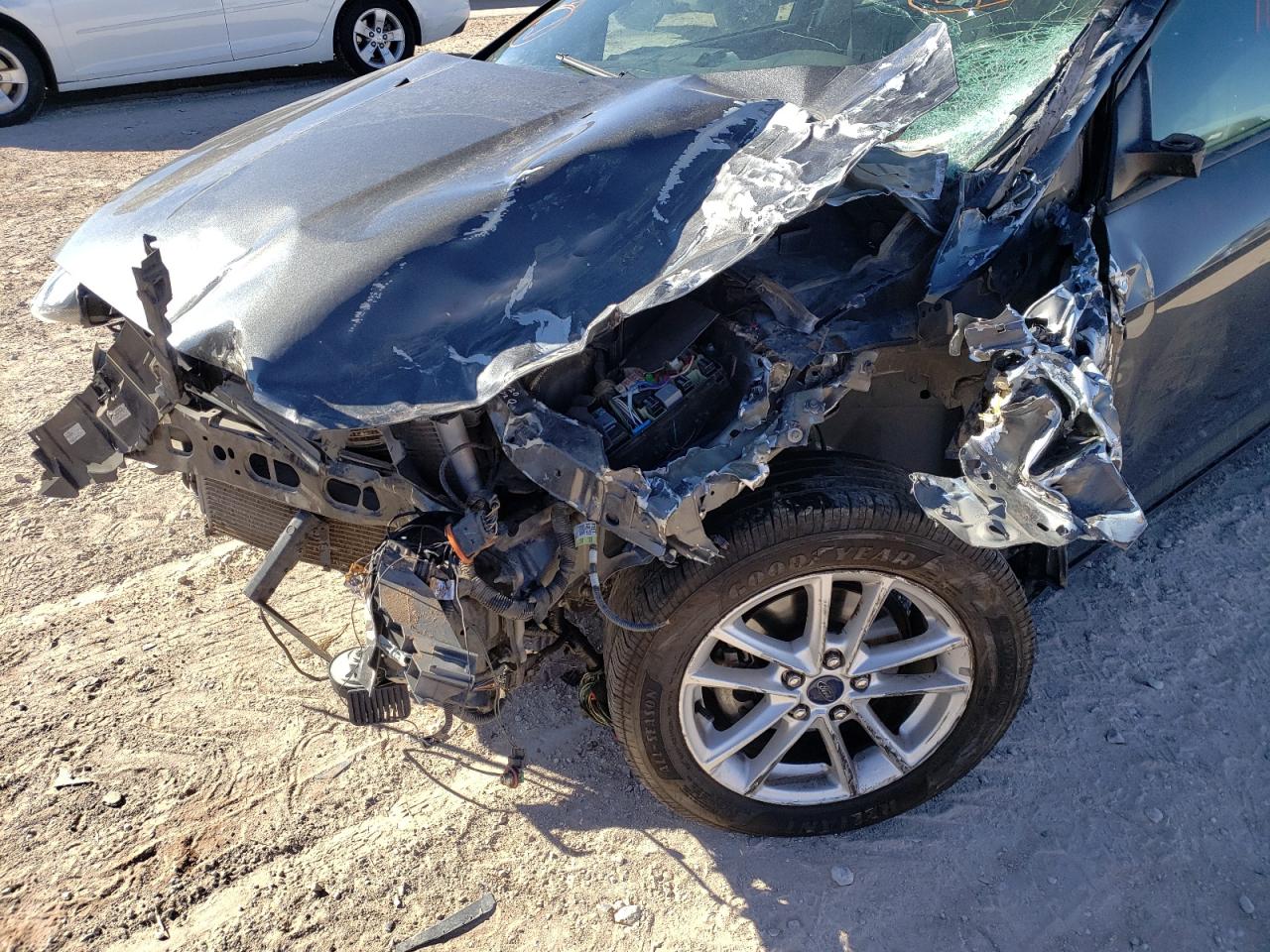Photo 9 from auction – 2015 FORD FOCUS SE with VIN 1FADP3F24FL262916