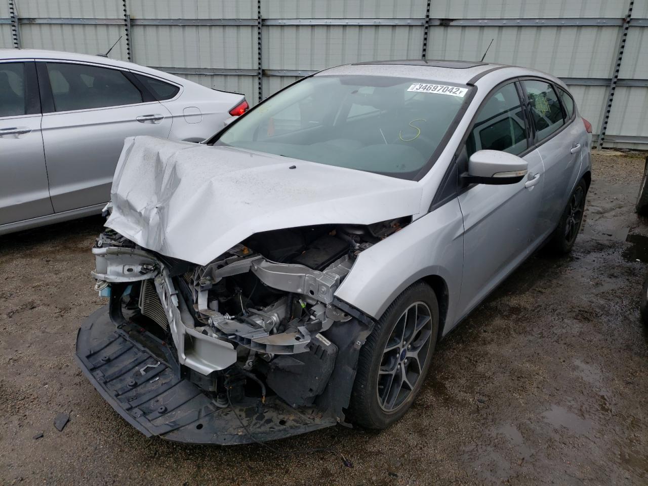 Photo 2 from auction – 2018 FORD FOCUS SEL with VIN 1FADP3M2XJL265105