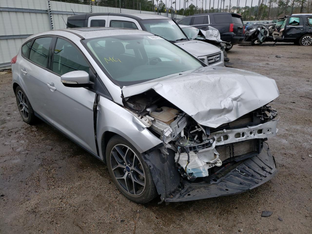 FORD FOCUS SEL 2018 with VIN 1FADP3M2XJL265105 - Photo from auction