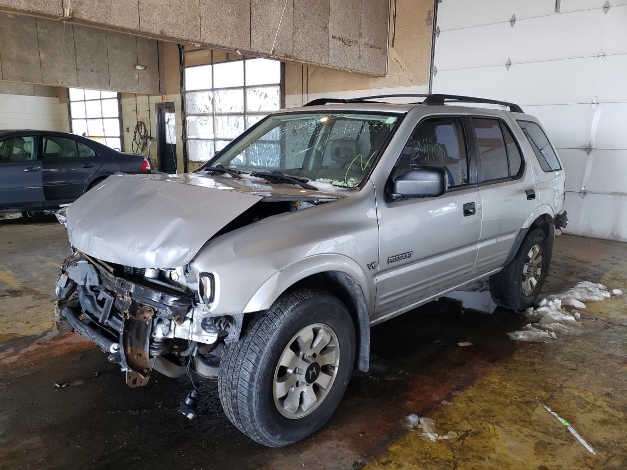 Photo 2 from auction – 1999 HONDA PASSPORT E with VIN 4S6CM58W9X4423172