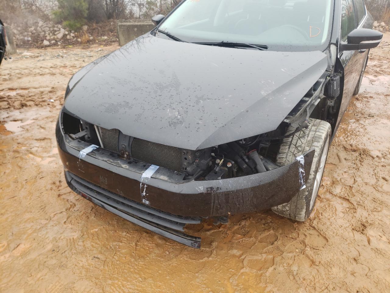Photo 9 from auction – 2014 VOLKSWAGEN PASSAT SE with VIN 1VWBT7A30EC070487