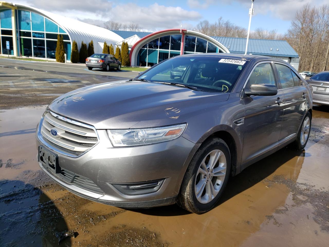 Photo 2 from auction – 2013 FORD TAURUS SEL with VIN 1FAHP2E88DG200636