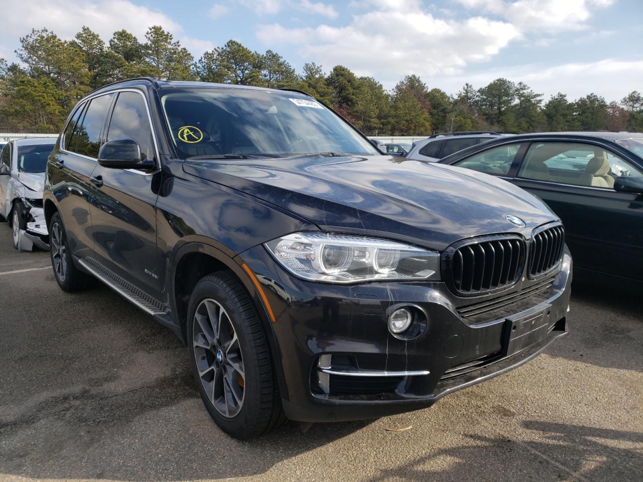BMW X5 XDRIVE3 2015 with VIN 5UXKR0C5XF0K65747 - Photo from auction
