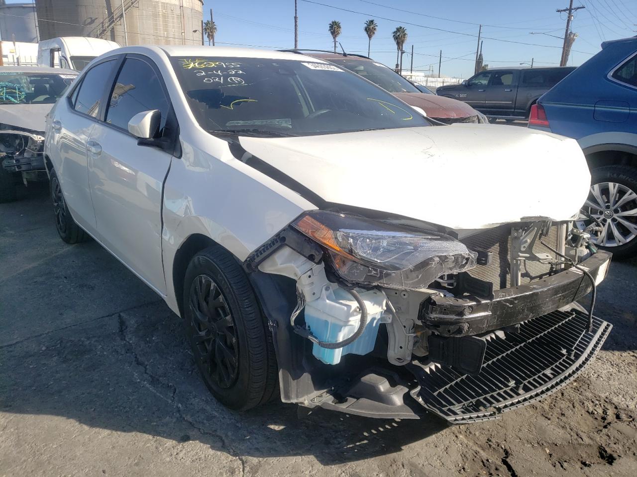 TOYOTA COROLLA L 2019 with VIN 5YFBURHE0KP868672 - Photo from auction