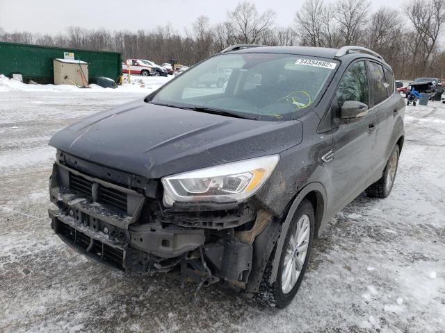 Photo 2 from auction – 2017 FORD ESCAPE TIT with VIN 1FMCU9JD6HUD17899