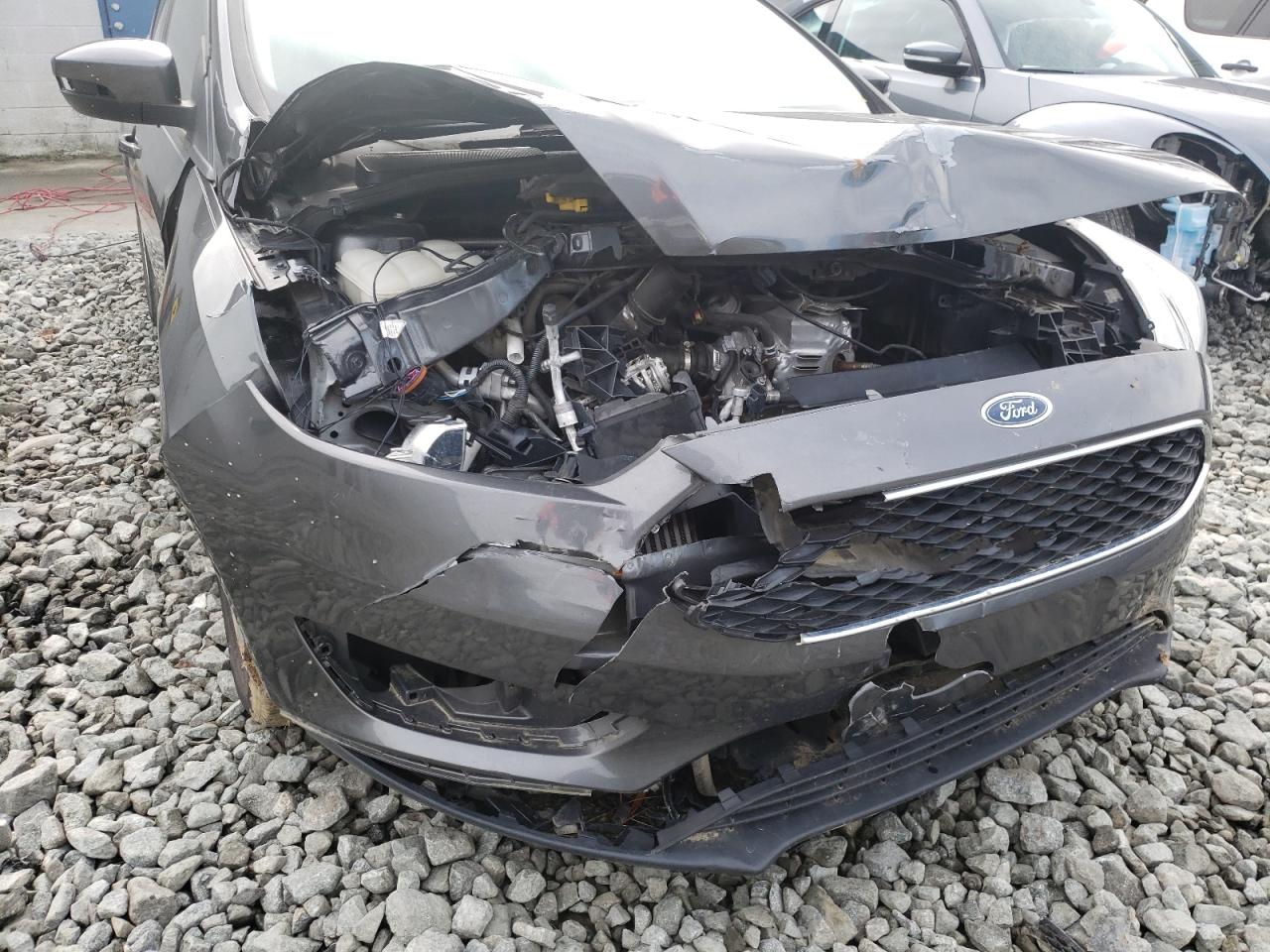 Photo 9 from auction – 2016 FORD FOCUS SE with VIN 1FADP3FE9GL355328