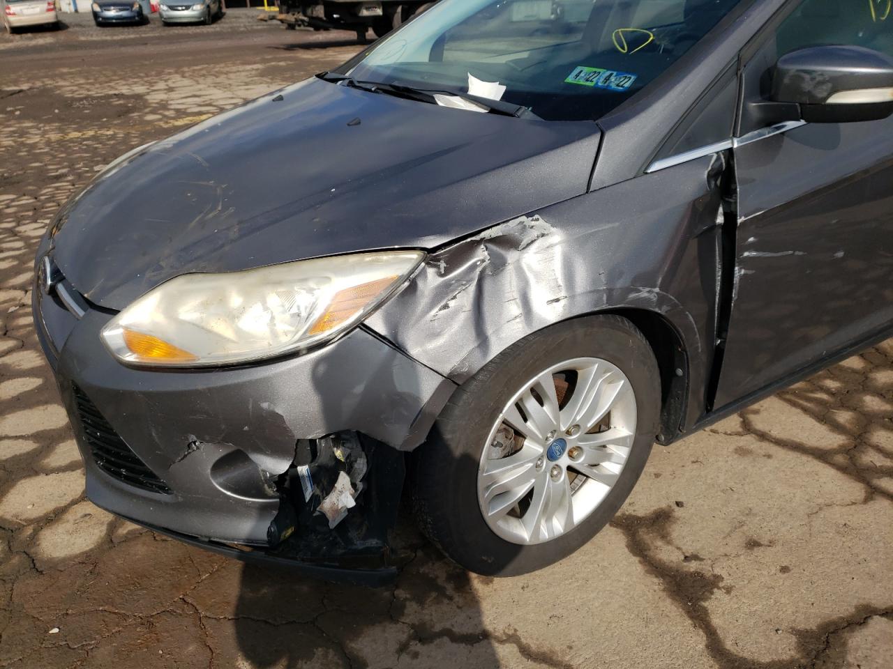 Foto 9 de la subasta – 2012 FORD FOCUS SEL con VIN 1FAHP3H28CL402332