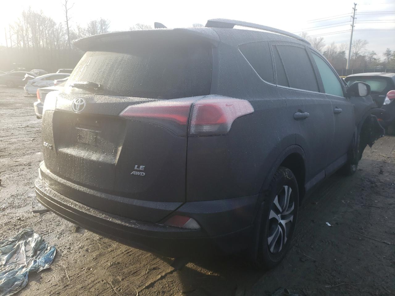 Photo 4 from auction – 2018 TOYOTA RAV4 LE with VIN 2T3BFREV0JW851227