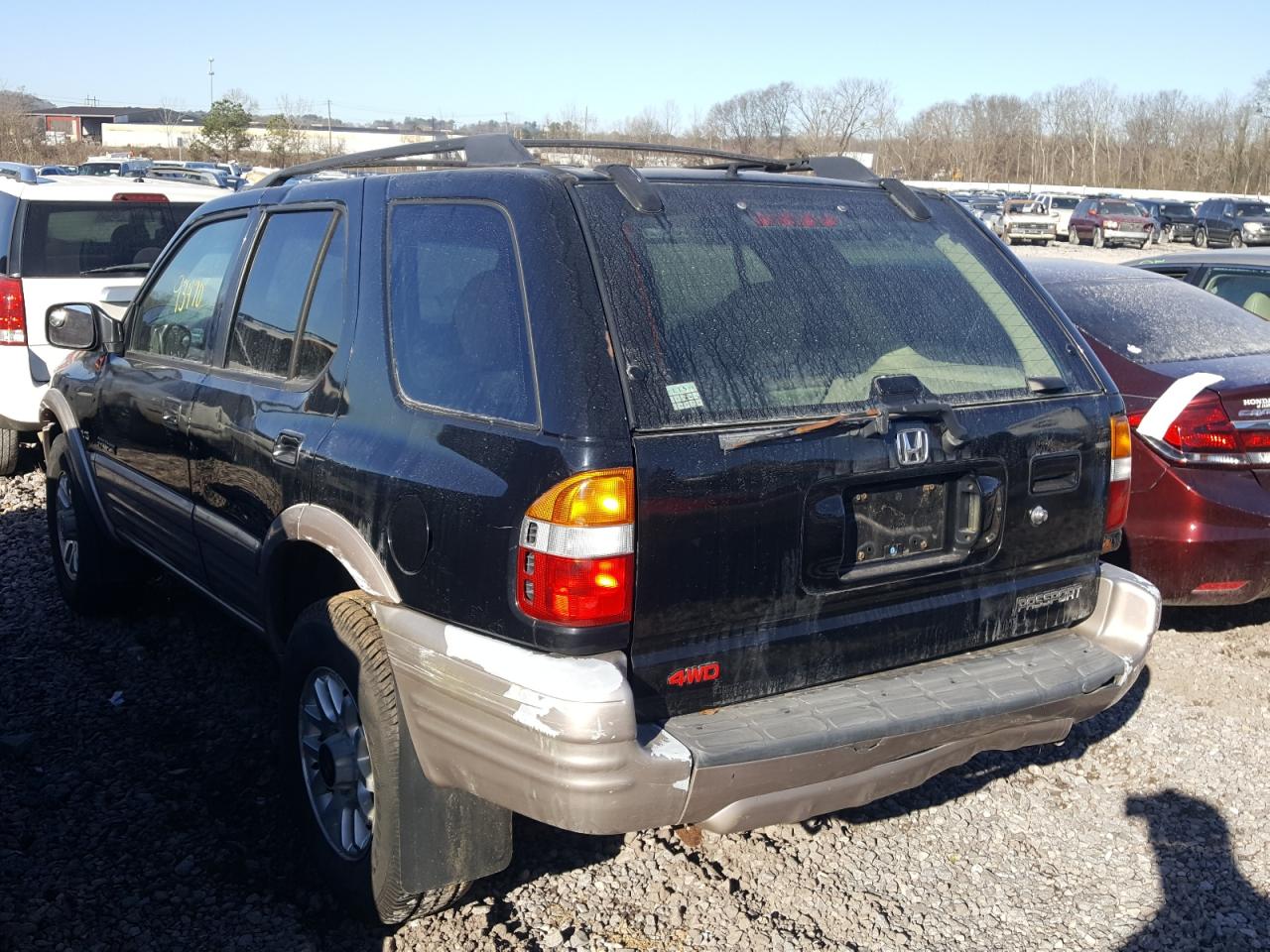 Photo 3 from auction – 2002 HONDA PASSPORT E with VIN 4S6DM58W424402873