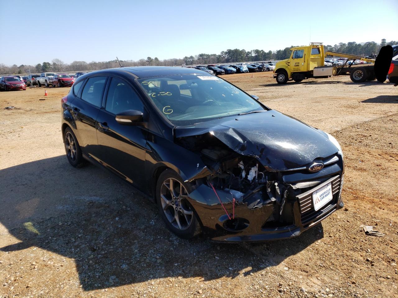 FORD FOCUS 2014 with VIN 1FADP3K22EL326634 - Photo from auction