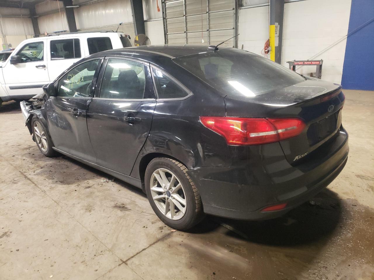Photo 3 from auction – 2018 FORD FOCUS SE with VIN 1FADP3F23JL214610