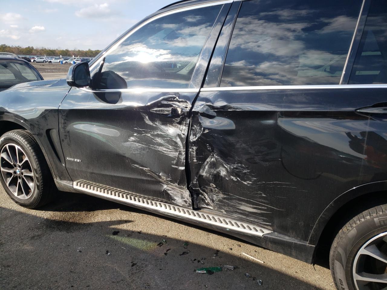 Photo 9 from auction – 2015 BMW X5 XDRIVE3 with VIN 5UXKR0C5XF0K65747