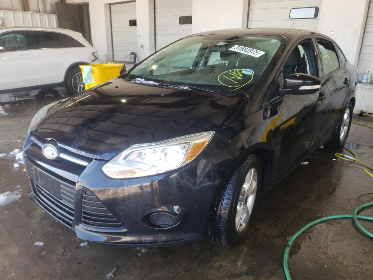 Photo 2 from auction – 2013 FORD FOCUS SE with VIN 1FADP3F22DL294972
