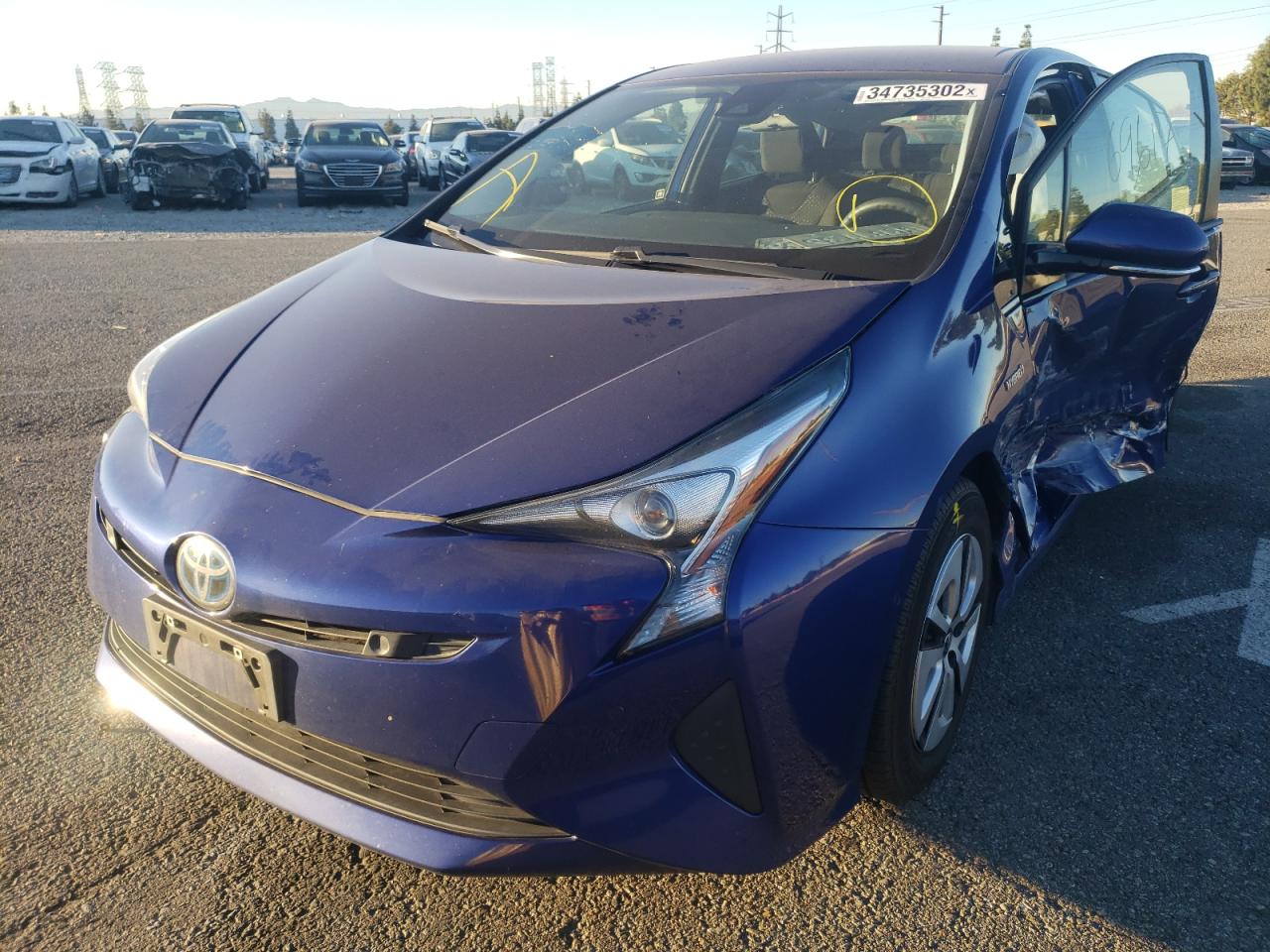 Photo 2 from auction – 2018 TOYOTA PRIUS with VIN JTDKBRFU2J3600892