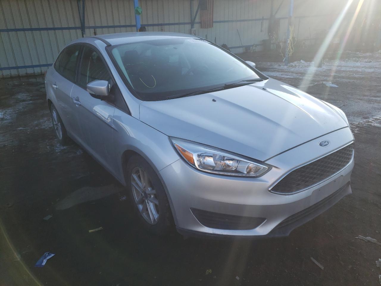 FORD FOCUS SE 2016 with VIN 1FADP3F27GL227174 - Photo from auction