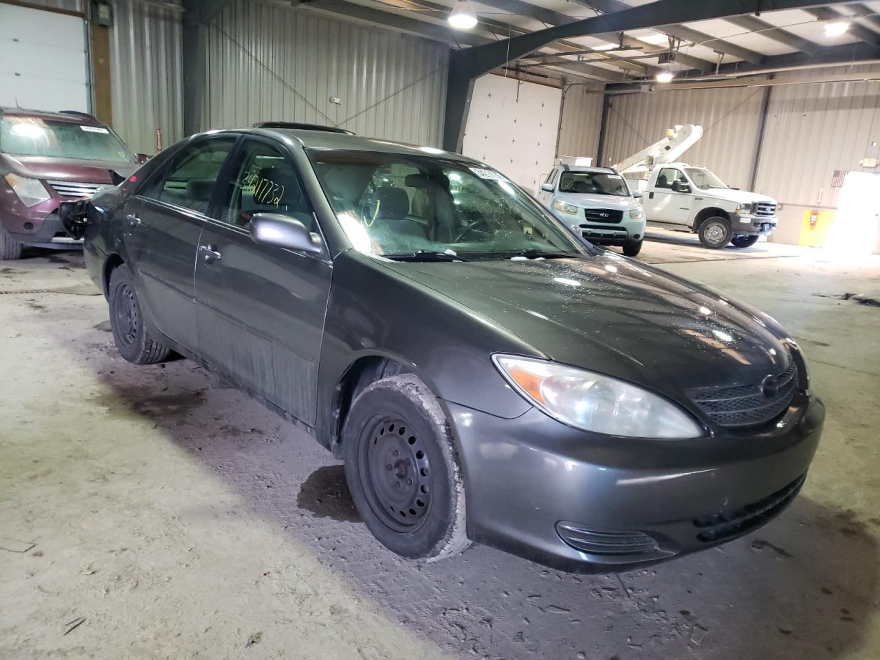 TOYOTA CAMRY LE 2004 with VIN 4T1BE32K64U810396 - Photo from auction