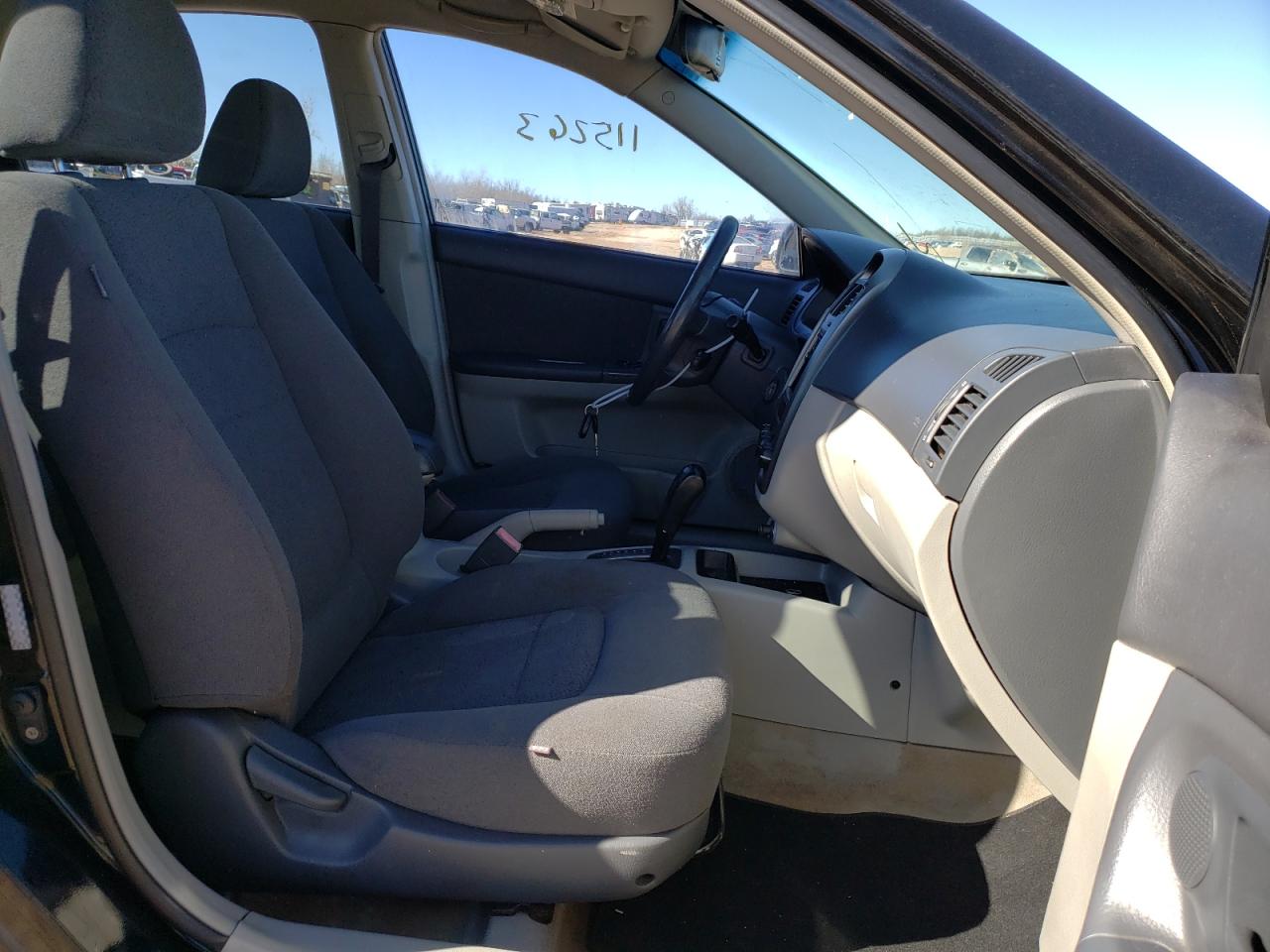 Photo 5 from auction – 2006 KIA SPECTRA LX with VIN KNAFE121565323279