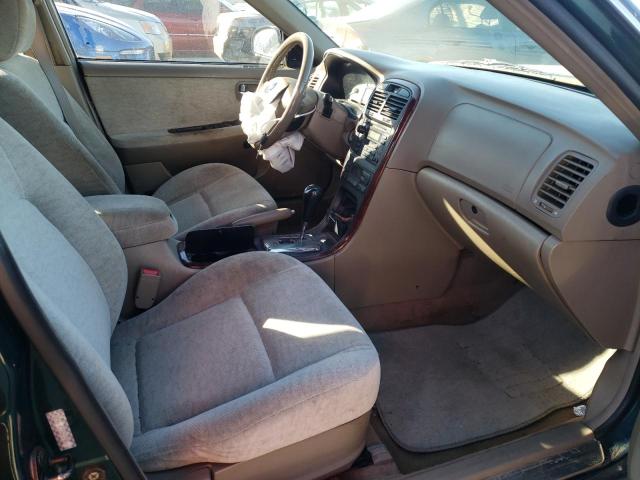 Photo 5 from auction – 2004 KIA OPTIMA LX with VIN KNAGD126945290111