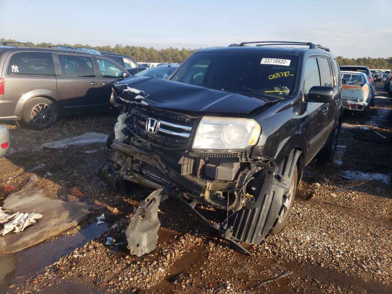 Photo 2 from auction – 2014 HONDA PILOT TOUR with VIN 5FNYF4H90EB019782